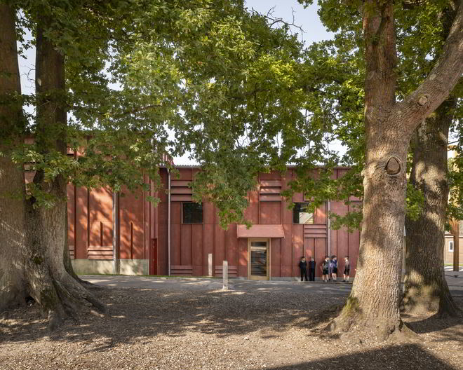 David Brownlow Theatre by Jonathan Tuckey with green surrounding